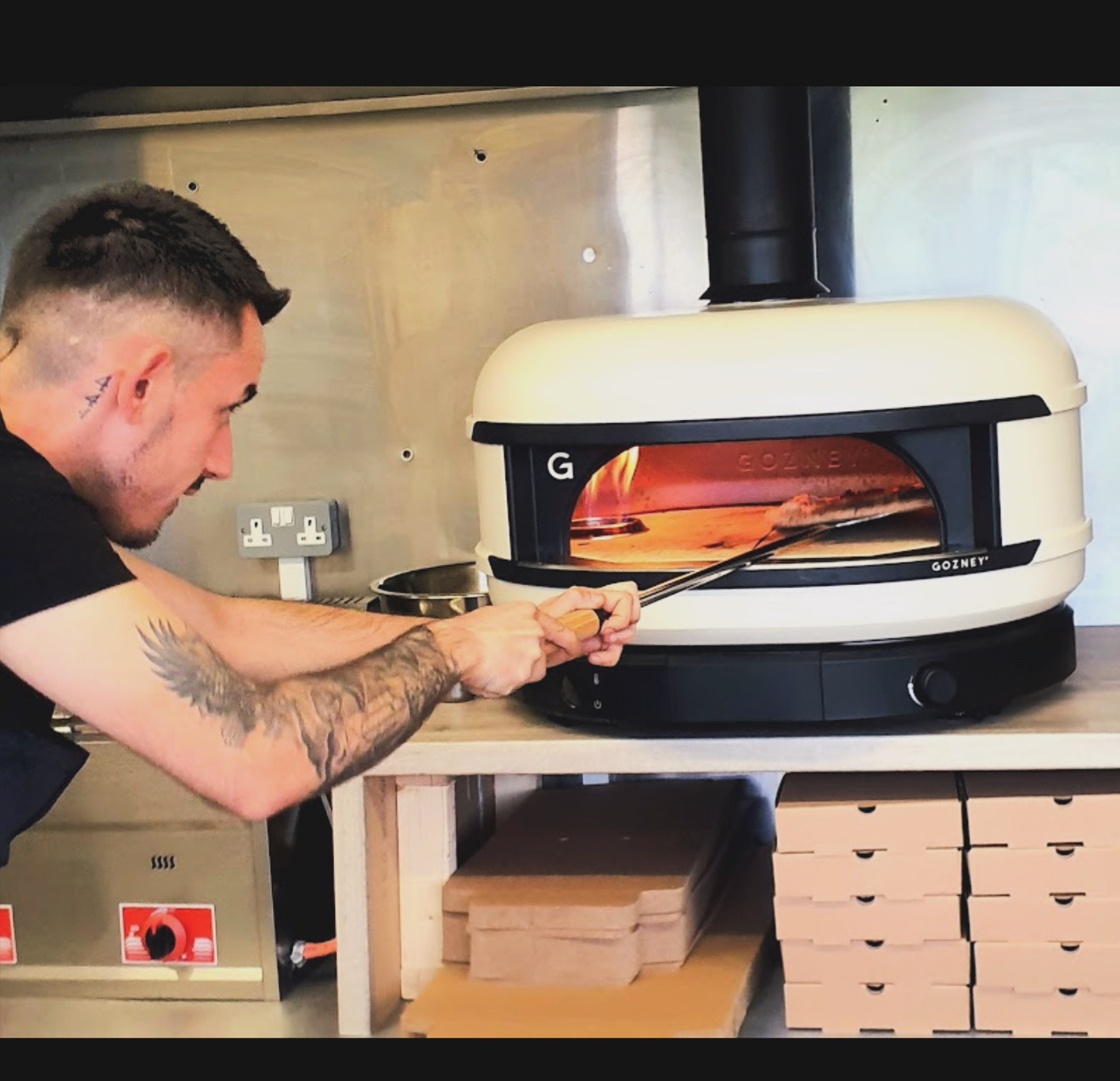 Firing a pizza in the stone oven